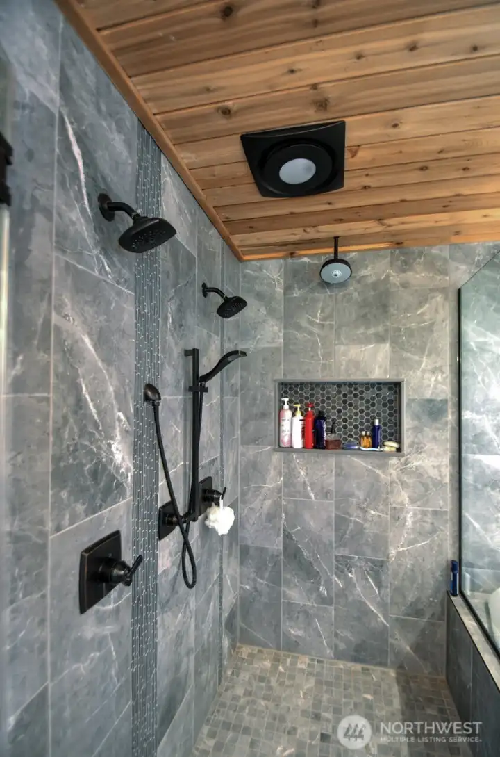 Beautiful double head shower in primary bathroom on main floor