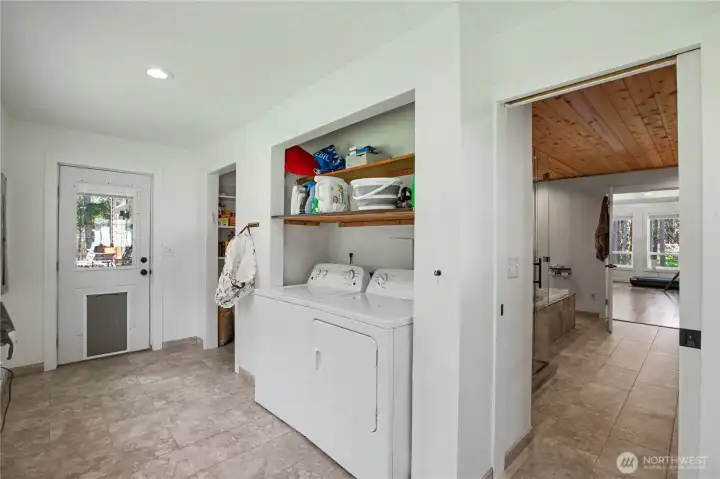 Laundry leading to main floor primary bathroom