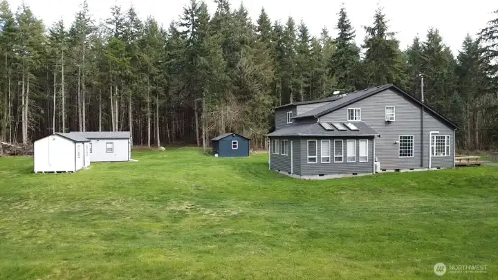 External shot of home and outbuildings