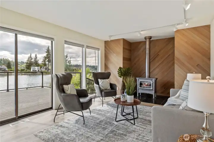 Informal living space off kitchen warmed by propane fireplace.