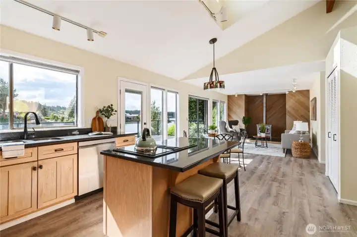 Easy flow from spacious kitchen area to outdoors.