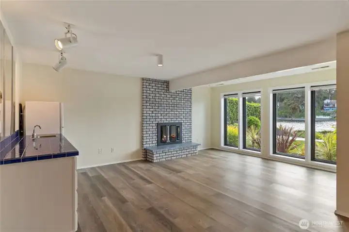Lower level living area with wet bar and wood burning fireplace/