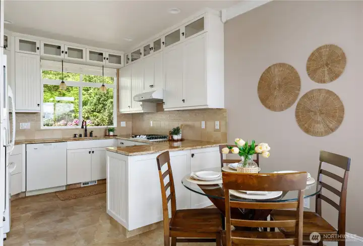 Kitchen with abundant storage and eating space