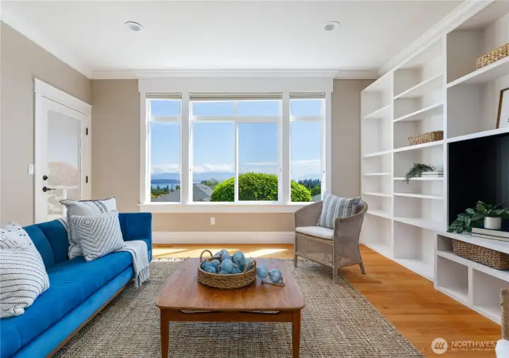 Lower level family room with views and door to covered deck to enjoy