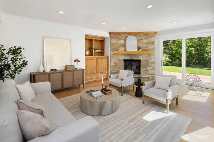 Custom real stone fireplace anchors the Family Room