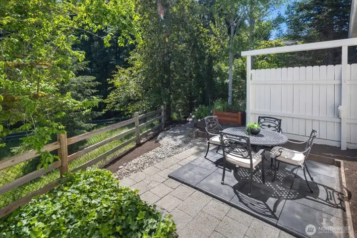 Side yard prepped for hot tub with pad and electrical