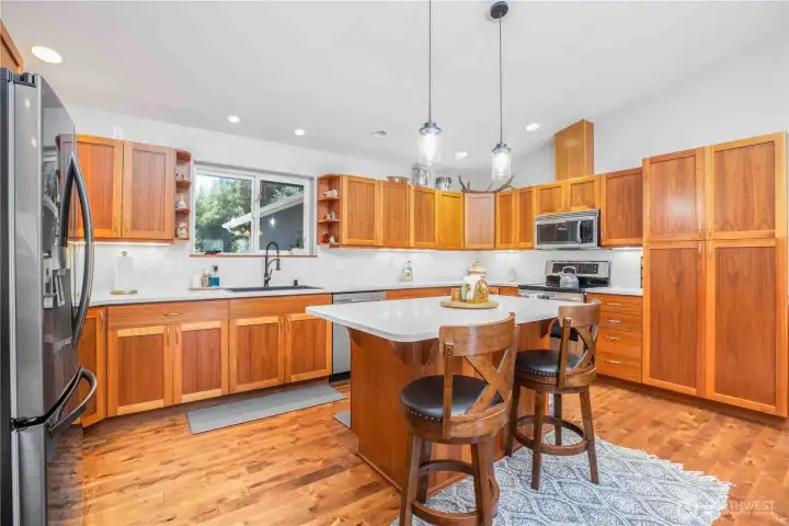 Stunning custom cypress cabinetry, quartz countertops and storage galore, who wouldn't want a kitchen like this?! Stunning custom cypress cabinetry, quartz countertops and storage galore, who wouldn't want a kitchen like this?!