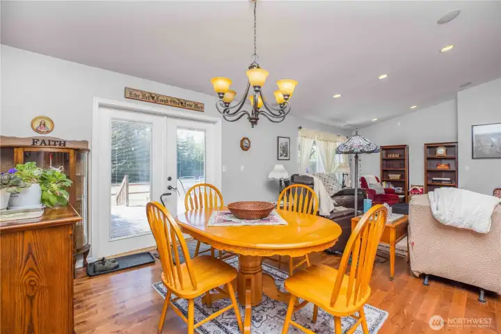Dining room opens to the kitchen and living. Dining room opens to the kitchen and living.