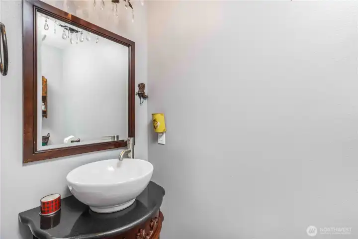Adorable powder room off of the living room Adorable powder room off of the living room