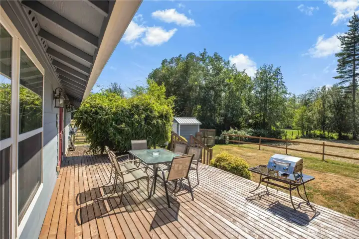 The back deck extends the length of the home The back deck extends the length of the home