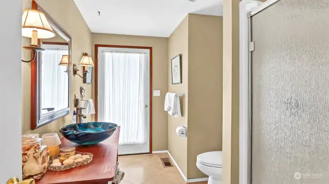 Custom touches throughout this home. This is the guest bathroom.