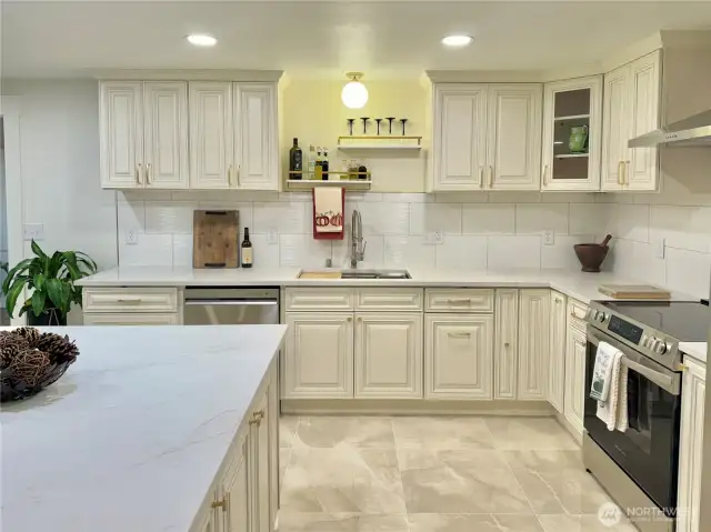 Porcelain tile floors, quartz countertops.