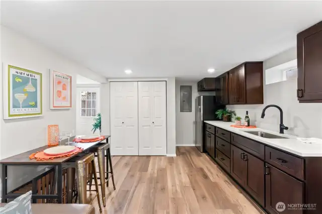 2nd Kitchen w/Dining Space, Laundry Closet and Exterior Access.