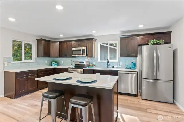 Brand-New Kitchen w/New Cabinets, Quartz Counters, Stainless Steel Appliances and Custom Full Tile Backsplash.