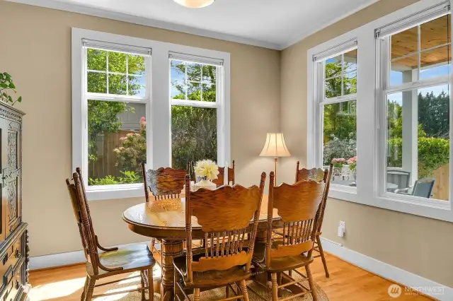 This charming eating nook looks south out to the deck. Again, incredible natural light!