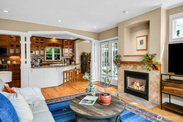 The spacious family room is a lovely complement to the kitchen. Another comfortable place to watch TV and to keep the chef company.