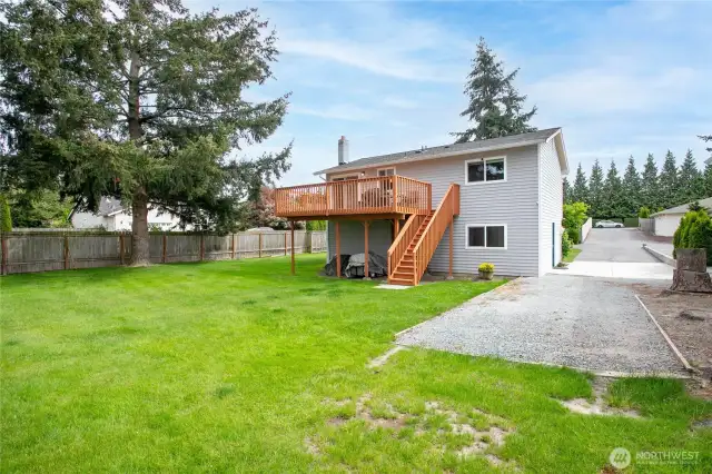 Backyard with gravel overflow/RV parking