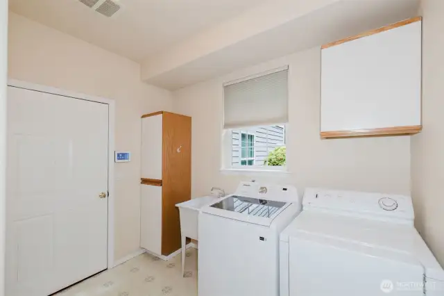 Laundry room.  Door leads to garage and loft space above garage.