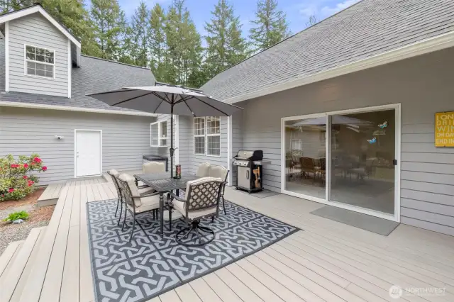 Back patio space spans the length of the kitchen and living room.  Perfect for summer BBQ's!
