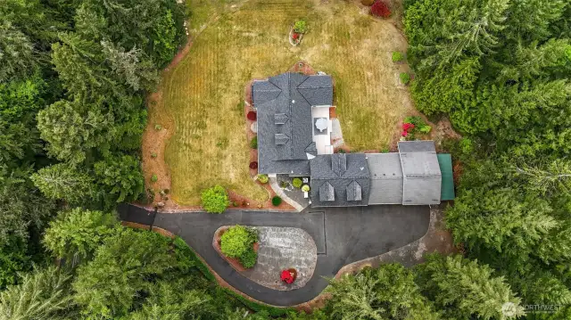 Like living in your own private park.  Open space with endless possibilities for sports, entertaining, gardening, etc.  Mature landscaping, and trees lining the perimeter for privacy.