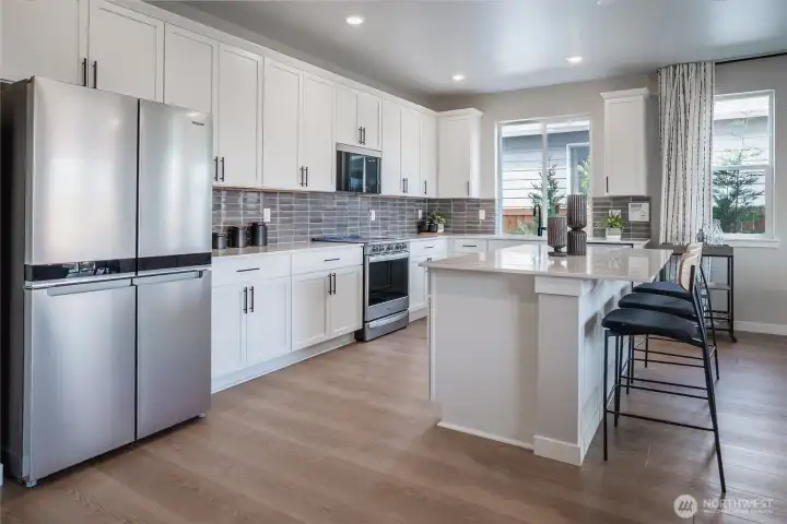 Image of model home of same plan. Colors/finishes may vary.