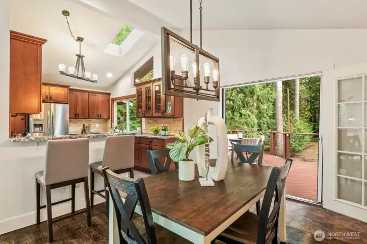 Informal dining room with easy access to the kitchen and the entertainment size back deck.
