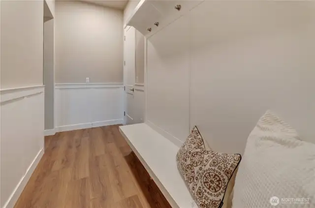 Extended hardwood flooring throughout the main level of this new home combined with liberal custom finishes throughout this new home.