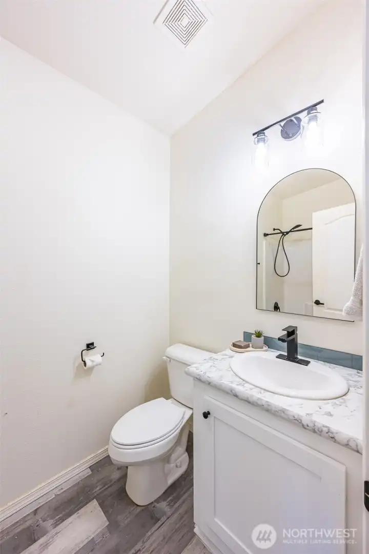 Hall/Guest Bathroom. Has Tub/Shower combo.