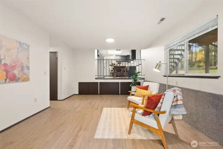 Through the kitchen, you'll have easy view of the lower level family room/play/ entertaining area.