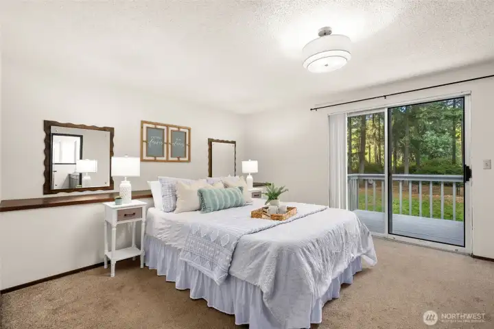 Primary features deck with stairs to backyard.