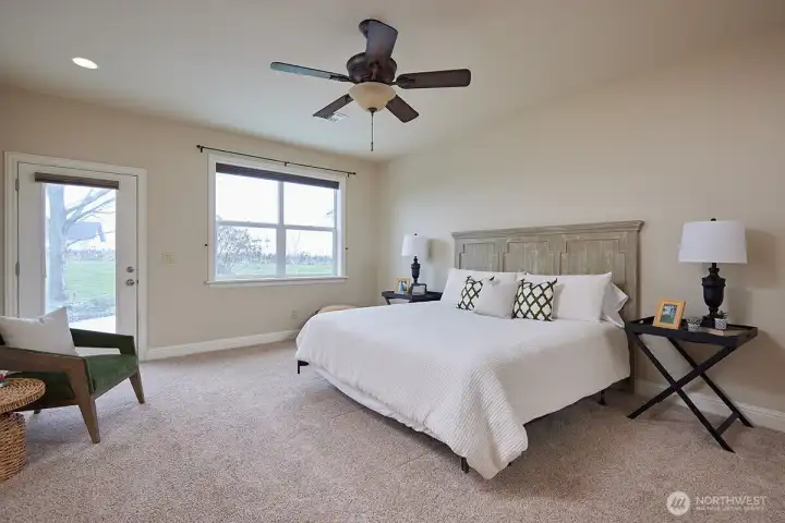 Primary Bedroom has access to back patio