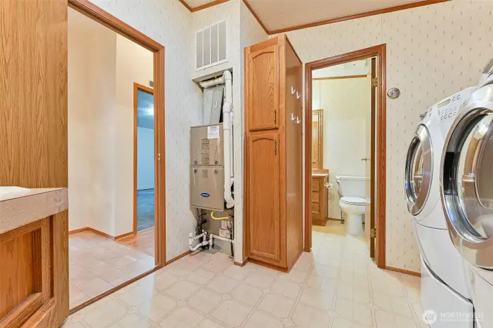 Laundry room. door leading to second bath