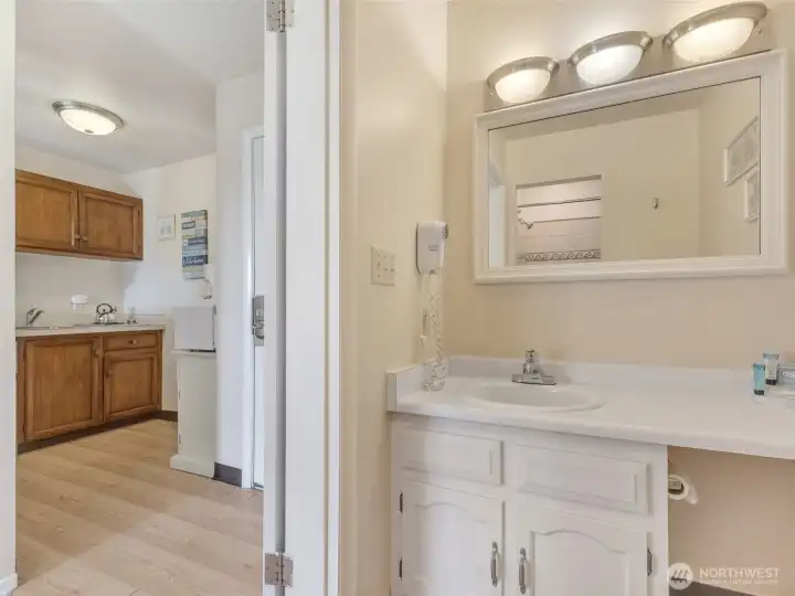 Bathroom and kitchenette in unit 419.