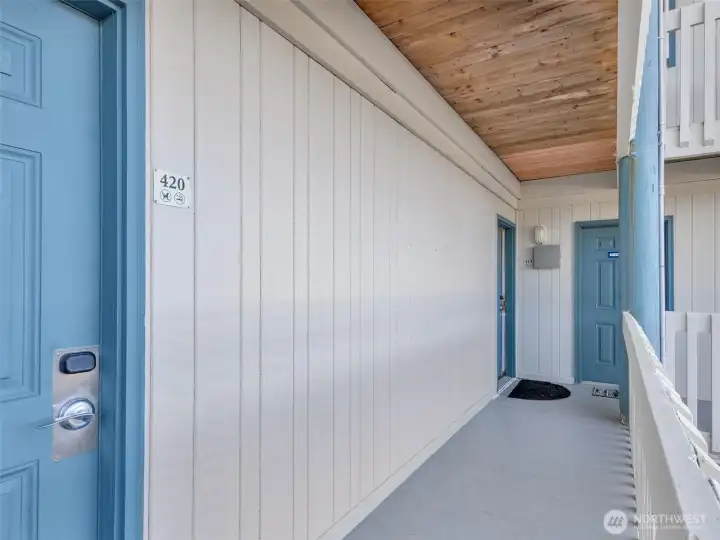 Separate entrances to both units. The building's "guest laundry" room is conveniently located outside unit 419.