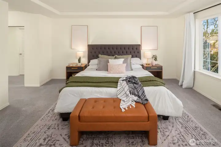 Primary bedroom with walk-in and full-size closets.