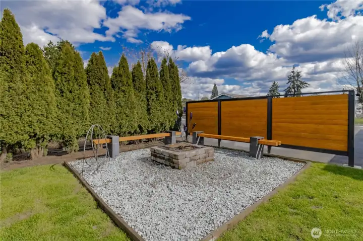 Fire pit area backyard with partial mountain view