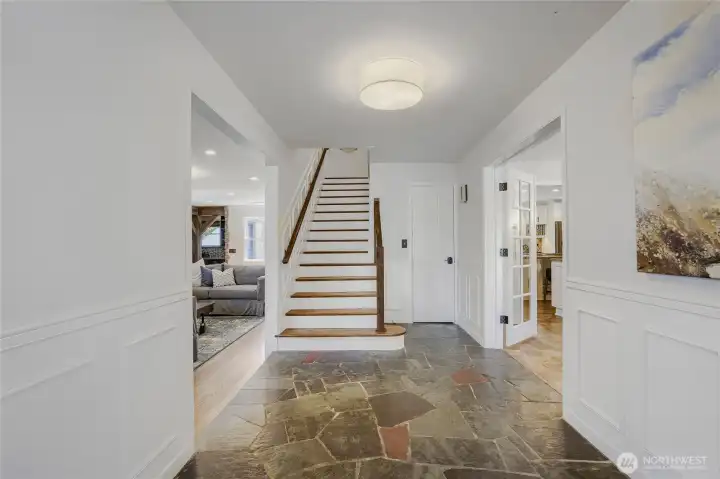 The clean, retro slate flooring and wainscoting greets with open arms.
