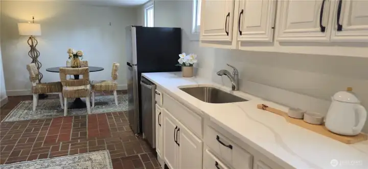 The newly update basement kitchen for multi-generational living or for cooking food for game nights!