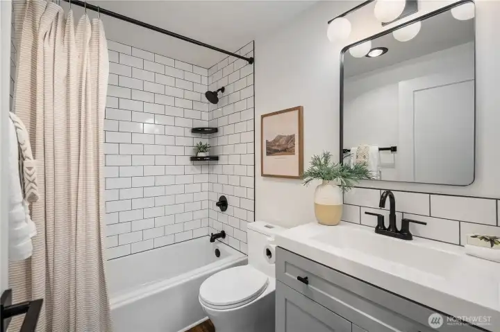 Completely remodeled bathroom with new plumbing, shower/tub, toilet, sink/vanity, fixtures, lighting and more Completely remodeled bathroom with new plumbing, shower/tub, toilet, sink/vanity, fixtures, lighting and more