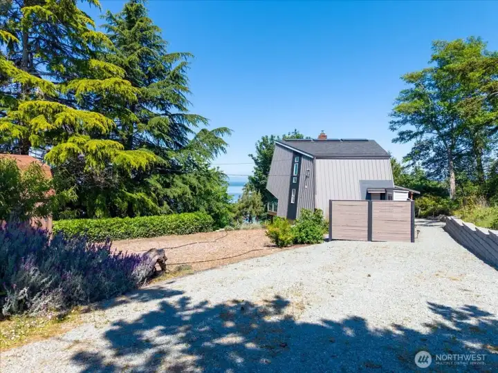 Main level private driveway entry.