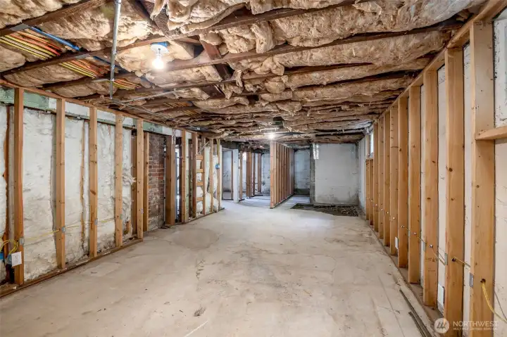 Basement is ready for someone to complete the unfinished remodel. HVAC, electrical, lighting, framing and water is ready to build out the bathroom, kitchenette and 1-2 additional rooms if desired with a separate entrance.