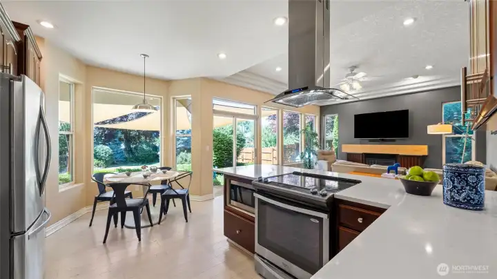 Modern is married to comfort in kitchen & informal living