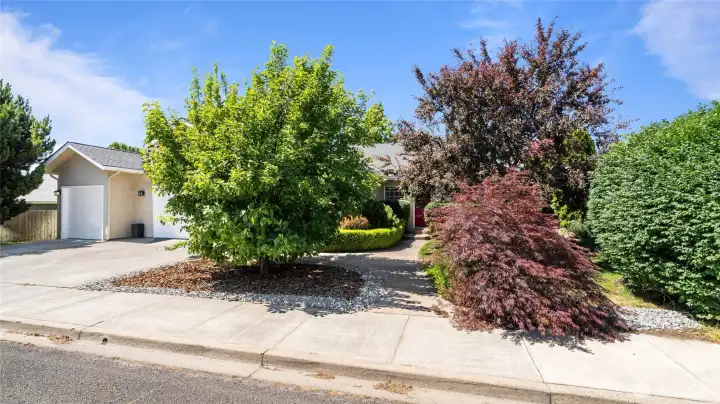 Front yard with 3-car garage