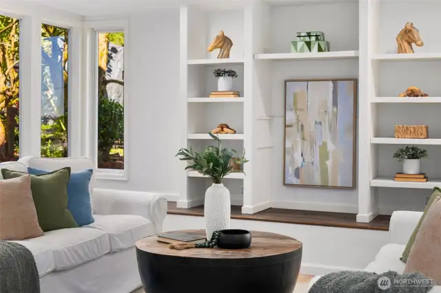 The lovely Rec room/bonus room on the lower level has custom built-ins with a private entry to the outside