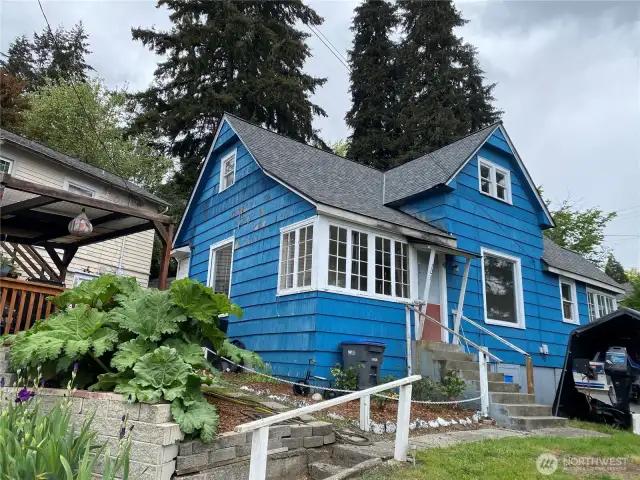 The 2 bedroom unit is on the main floor, and the 1 bedroom unit that needs work is upstairs.