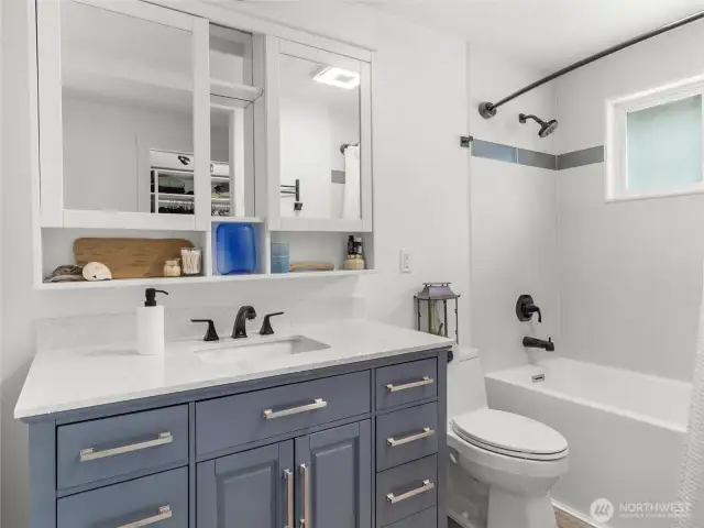Primary. That shower is fully tiled and that tub is DEEP.