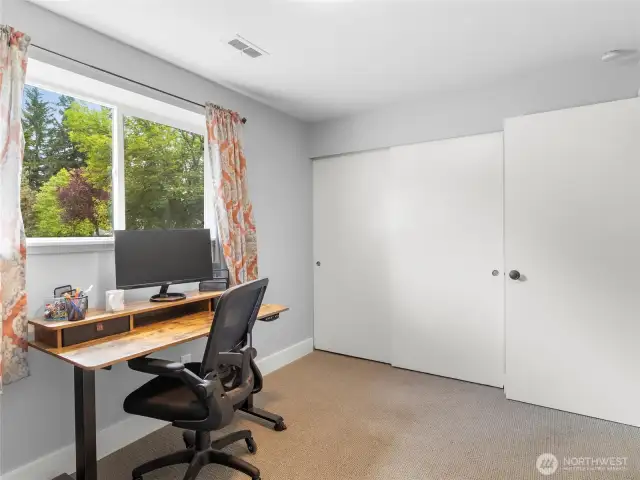 Downstairs Bed One now used as an office. That closet is 2.2ft x 9+ feet. More than 18 sf of storage!