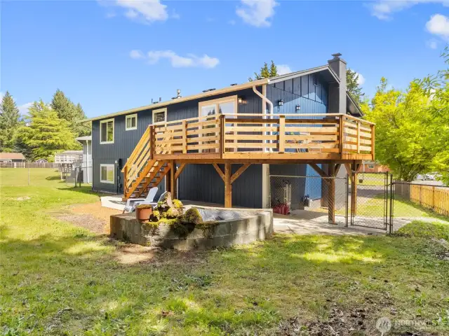 Deck wraps around the west side of the home providing ultimate warm hang outs with your people!