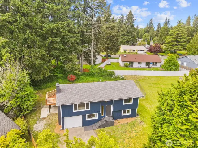 The deck is very private on the west side especially if the next buyer puts plants on the street side. Virtually no neighbors. Just green trees