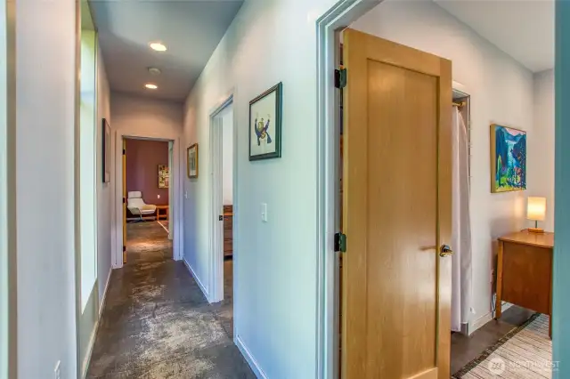 The hallway has vaulted ceiling showcasing the architecture.